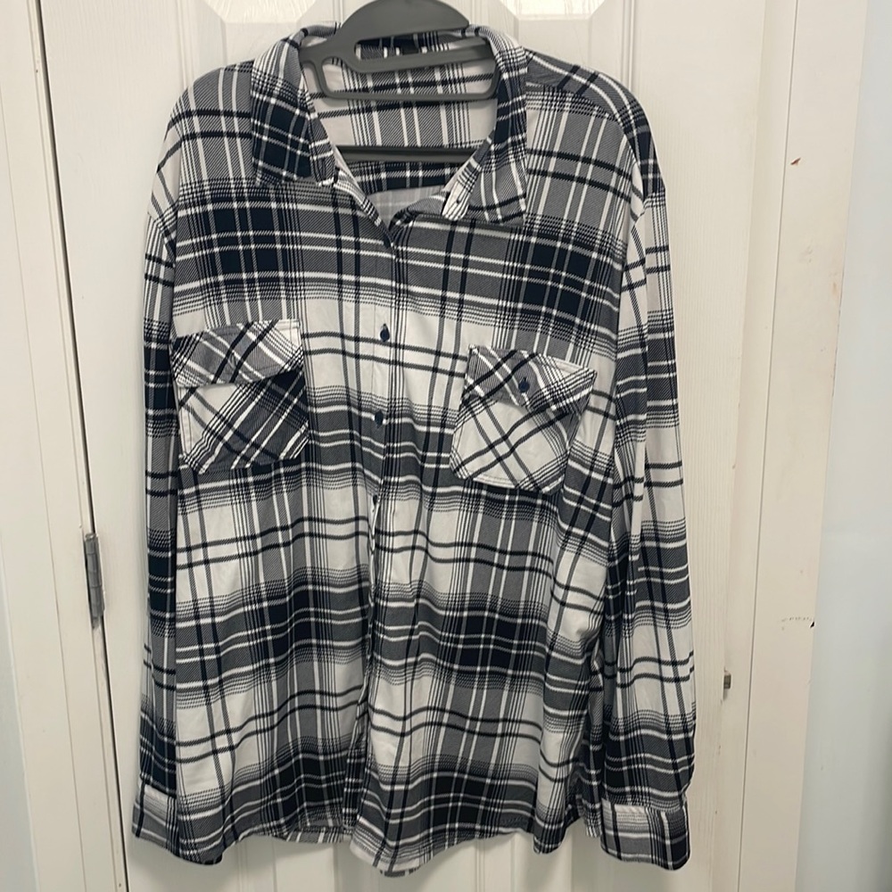 A white and black stripe shirt